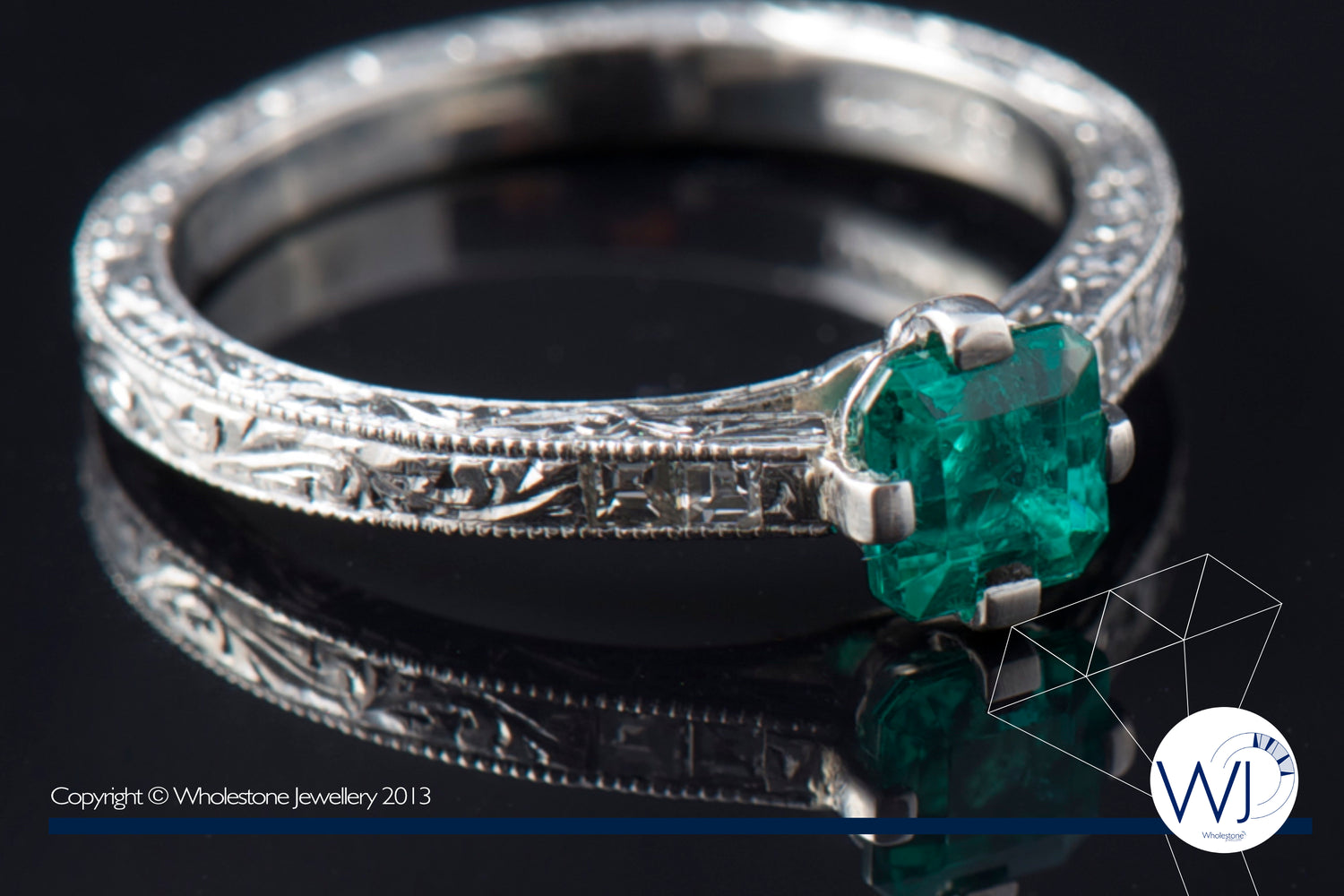 Art Deco style engraving Emerald ring set in Platinum by Wholestone Jewellery