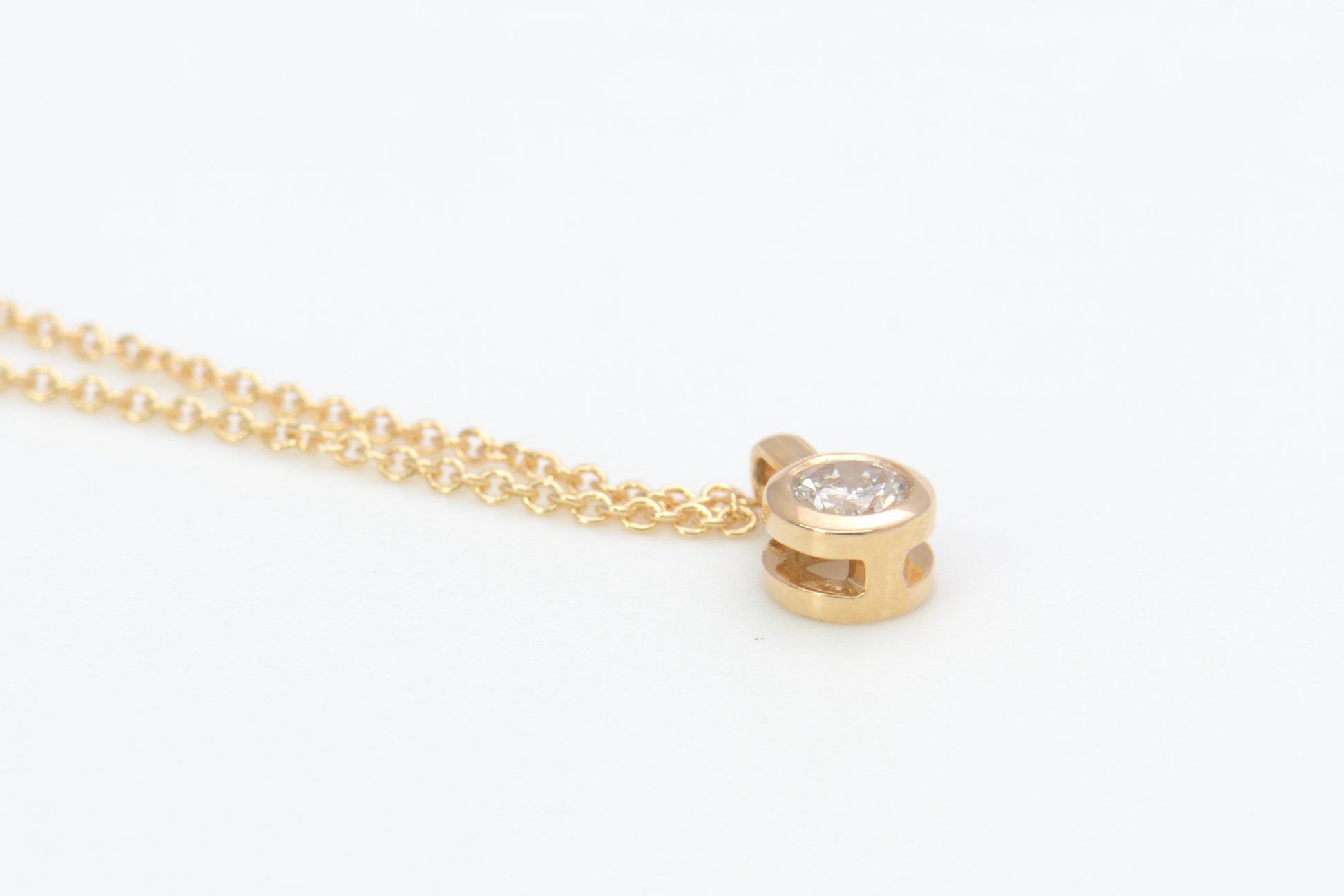 Necklace with Lab Grown Diamond Pendant Autumn Collection 24 Full Bezel Set Design One of Set One Angled Side View 1  by Wholestone Jewellery