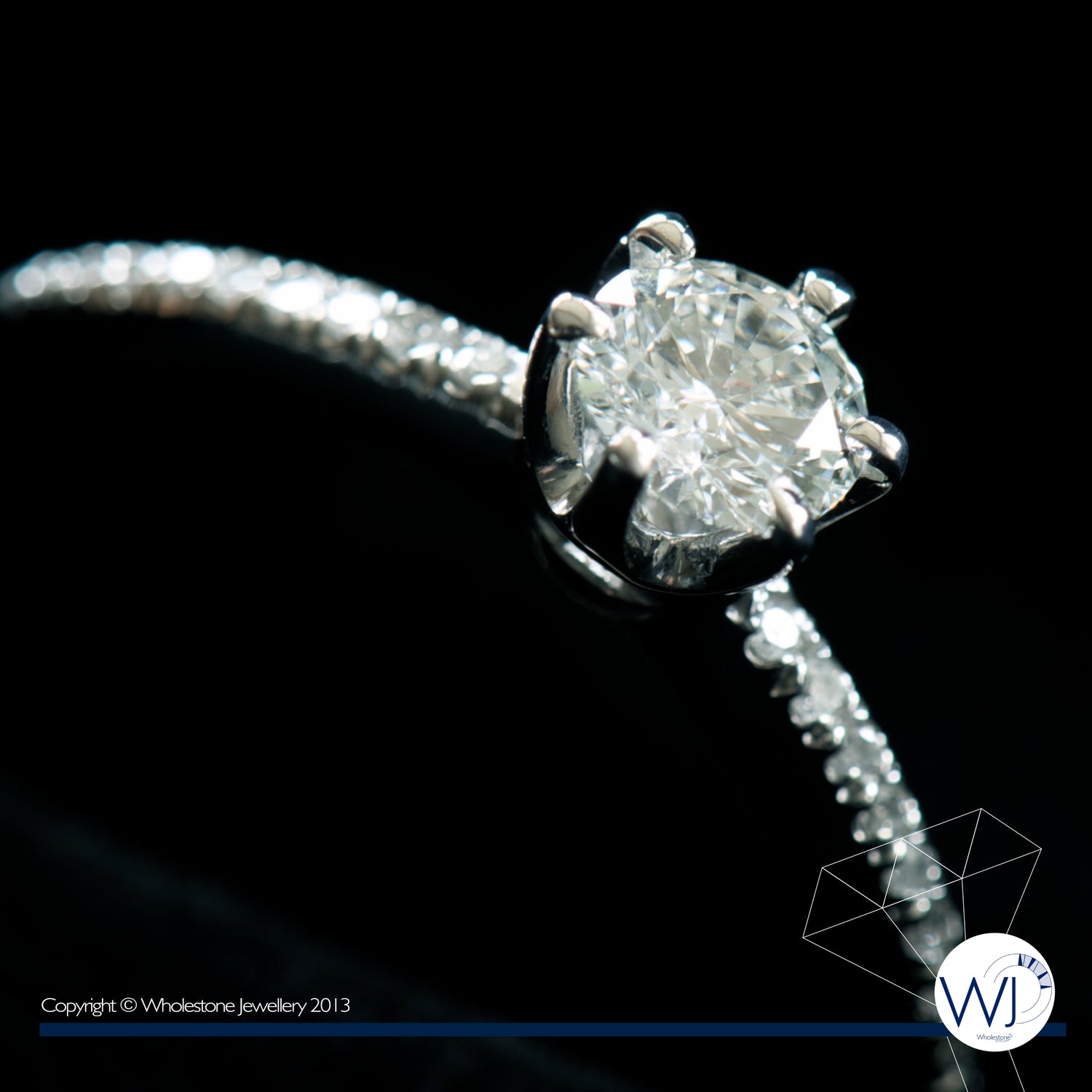 Solitaire Diamond Ring knife edge pave set shoulders by Wholestone Jewellery